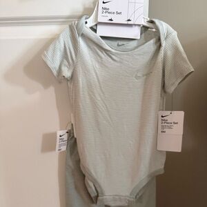 Nike 2 piece set. White and sage green stripes with sage green solid pants